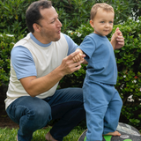 Dad and Toddler matching in Light Blue Tshirt and Navy Blue tshirt and sweatpants