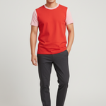 Engine Red with Pink | Man wearing a red and pink shirt with gray pants on a white background