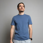 Navy Blue | Man wearing a blue t-shirt  