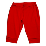 A pair of red cotton jogger pants with an elasticized waistband. made of peruvian pima cotton