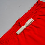 Close Up Details Arquia Cotton Shorts in Engine Red