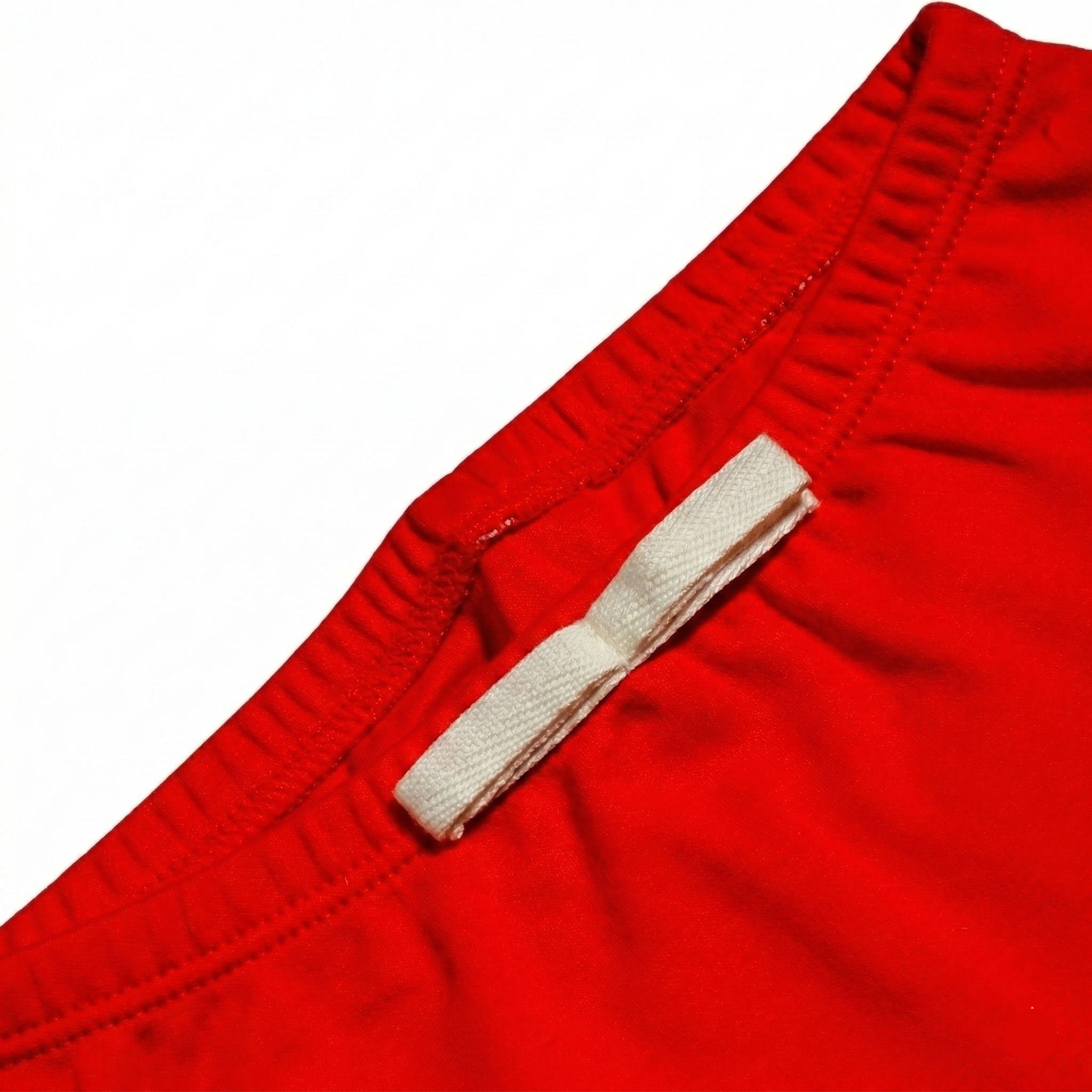 Engine Red | Close Up Details Arquia Cotton Shorts in Engine Red