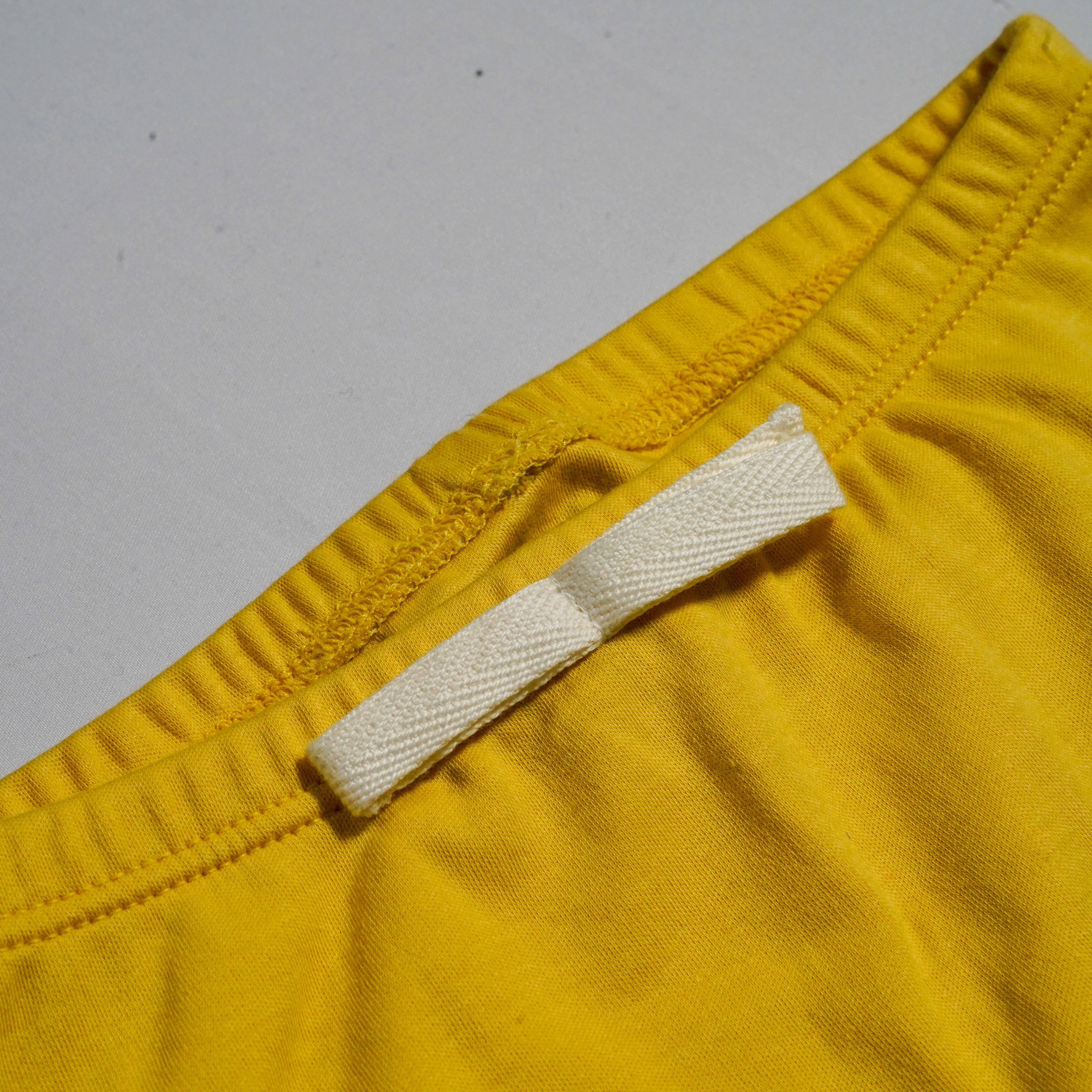 Close Up Details Arquia Cotton Shorts in Misted Yellow