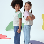 Toddlers wearing Arquia kids color block tshirt white with pink and white with green 