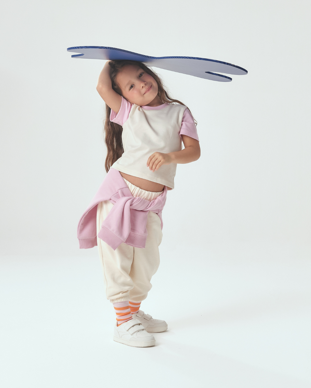 Toddler wearing White with Pink Color Block Tshirt and white sweatpants