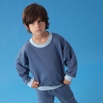 Toddler wearing Arquia contrast sweatshirt in navy blue with light blue made of premium peruvian cotton