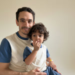 White with Navy Blue | Man holding a child with matching tees in white with navy blue