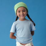 Toddler wearing Arquia Kids tshirt in solid light blue made of 100% peruvian pima cotton