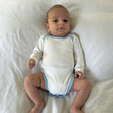 Long Sleeve Onesie in White with Chambray Blue