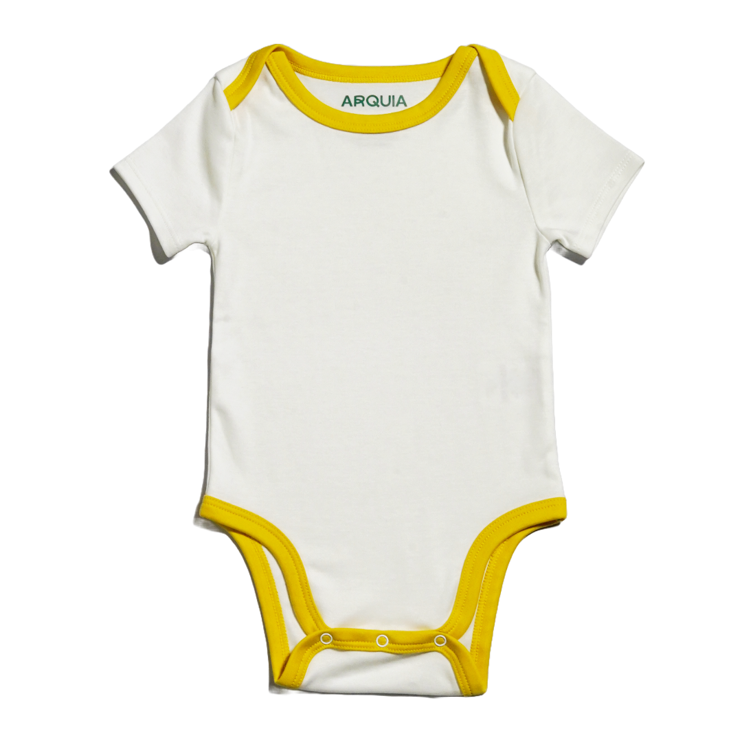 Arquia short sleeve bodysuite or onesie in white with misted yellow piping. made with peruvian pima cotton