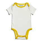 Arquia short sleeve bodysuite or onesie in white with misted yellow piping. made with peruvian pima cotton