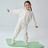 Toddler wearing premium cotton white sweatpants and sweatshirt